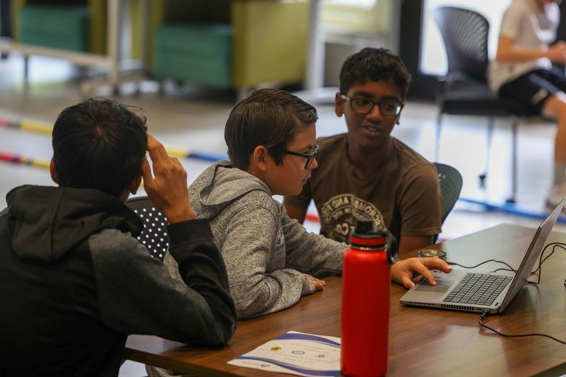 students working on computer