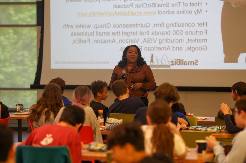 Melinda Emerson speaking with students